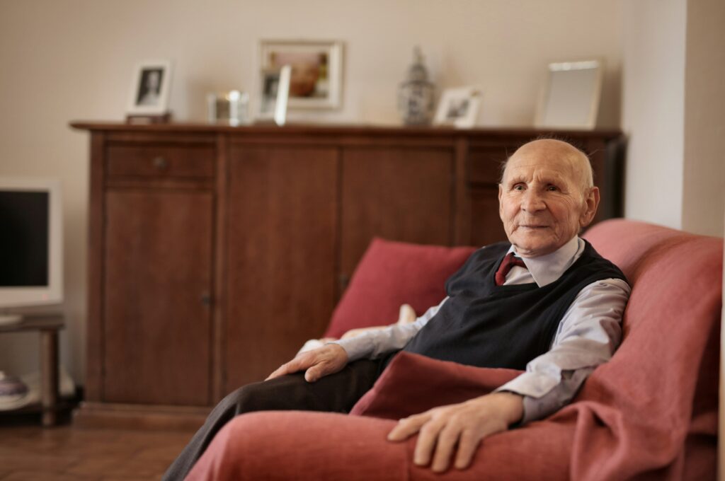 man relaxing on couch